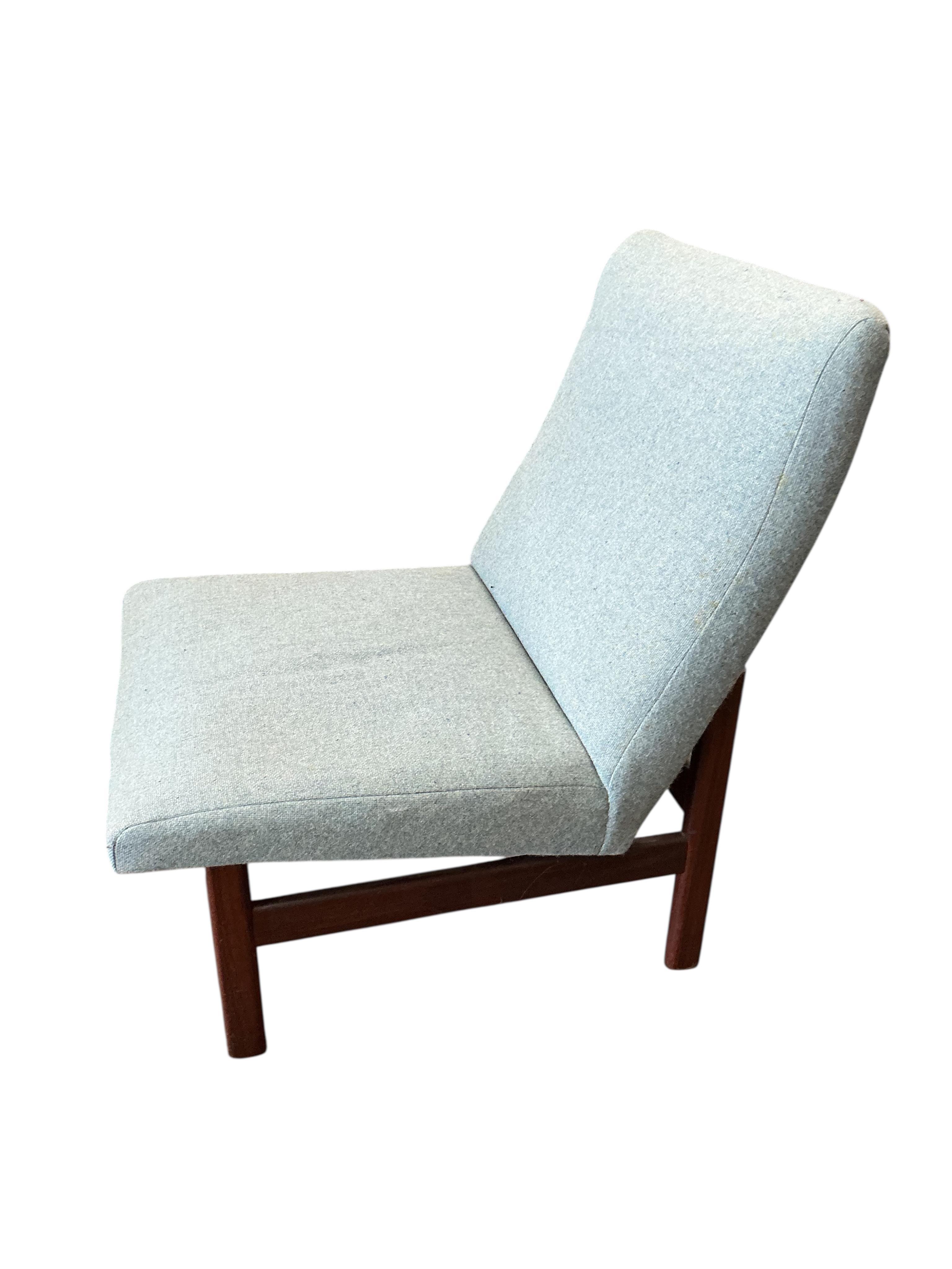 An Afromosia cocktail chair in a Danish style, width 55cm, depth 60cm, height 78cm